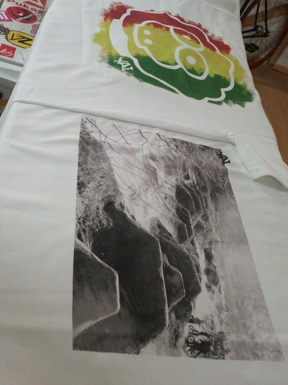 A white t-shirt printed with a large black and white photographic image
