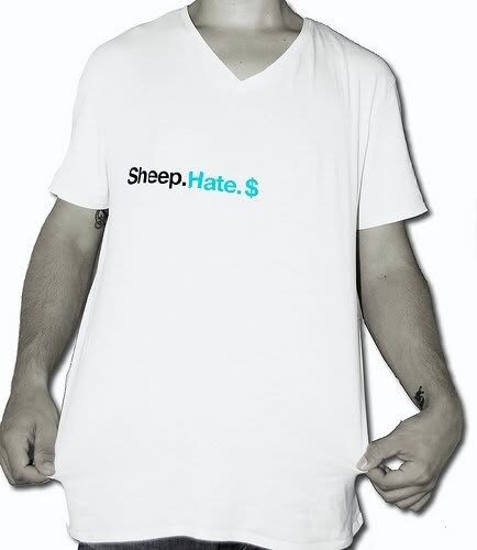 A white v-neck t-shirt printed with the words Sheep. Hate. $