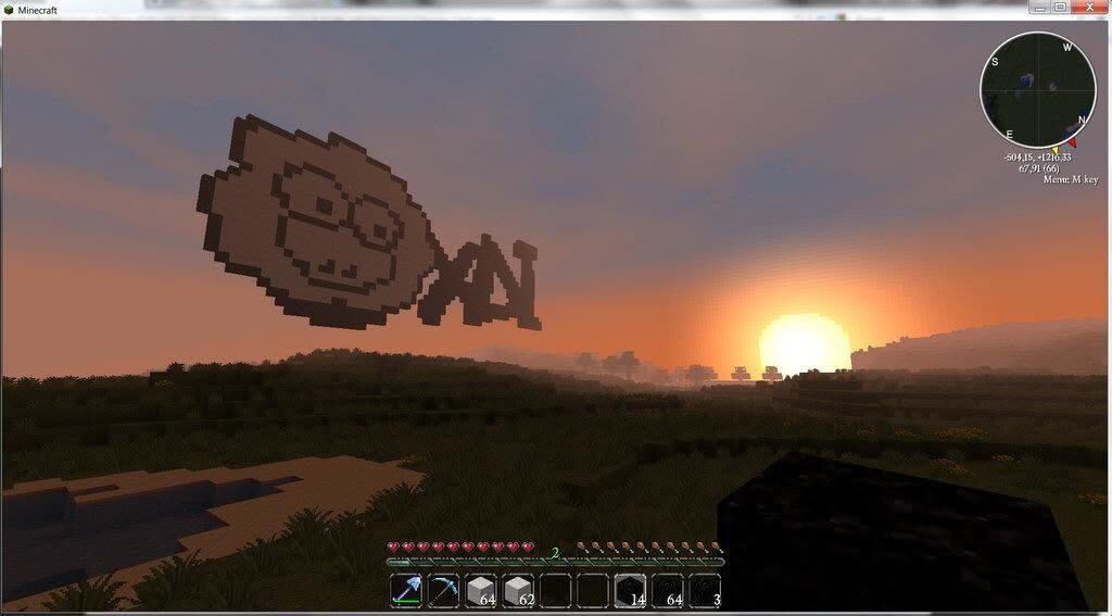 A computer desktop with a XAI sheep wallpaper over a sunset photograph